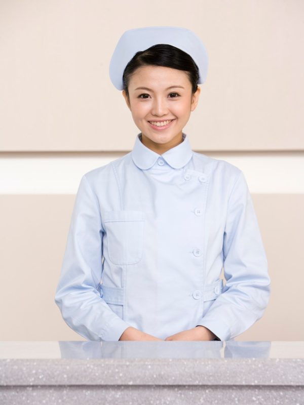 young-nurse-poised-at-nurses-station.jpg